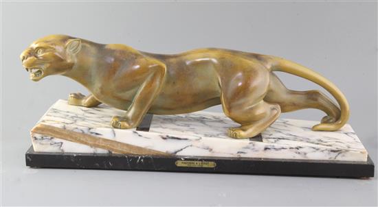 Guy Débe. A French Art Deco patinated spelter model of a crouching leopard, Panthere A LAffut, 21.5in.